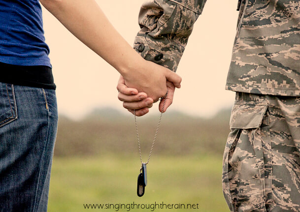 holding hands, dog tags, commitment